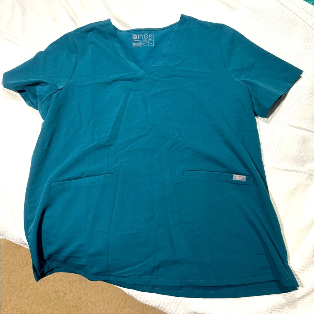 Like new Caribbean Blue scrubs! Never worn but they have been washed.
